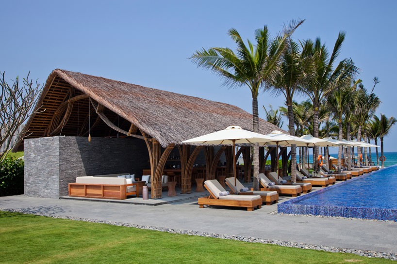 vo trong nghia's naman beach bar combines bamboo, thatch and stone