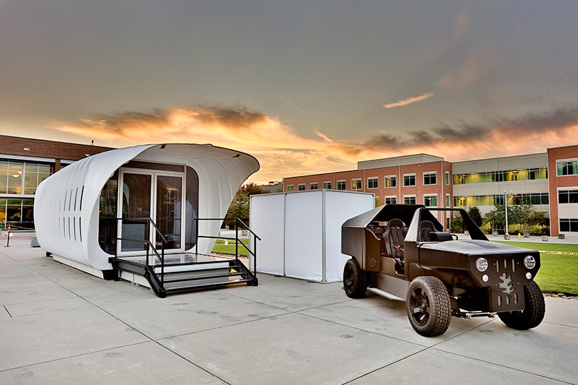 3D printed vehicle and SOM-designed building power each other wirelessly