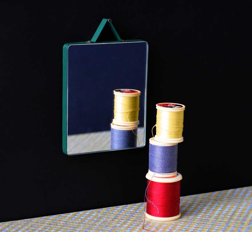 ruban mirrors for hay by inga sempé suspended by embedded ribbon