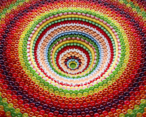 sam kaplan builds food pits and pyramids with candies, cookies + tea cakes