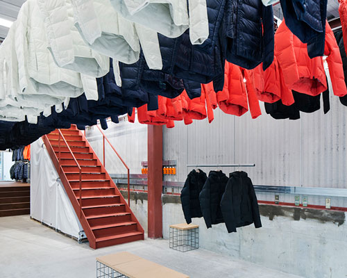 schemata installs movable hangers inside descente blanc retail store