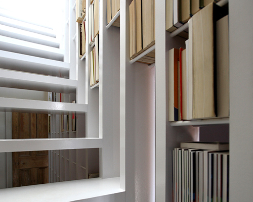 tamir addadi architecture achieves a sense of lightness in stair-bookcase