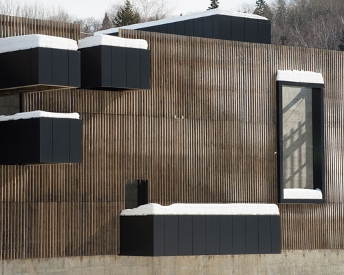 atelier pierre thibault punctuates hydroelectric plant with loggias in quebec