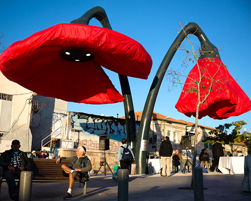 HQ architects installs giant flowers that react to passersby in jerusalem