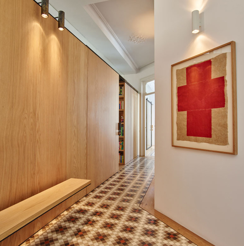 built architecture balances existing + new in renovation project