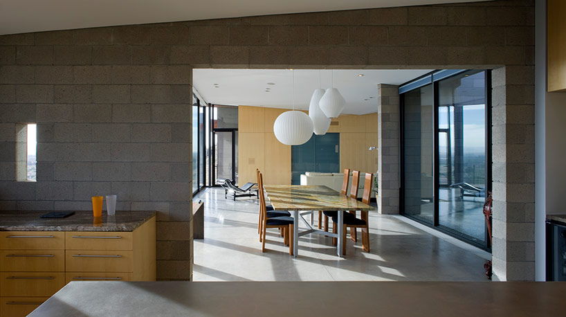 chen + suchart studio embed mummy mountain residence into a slope in arizona