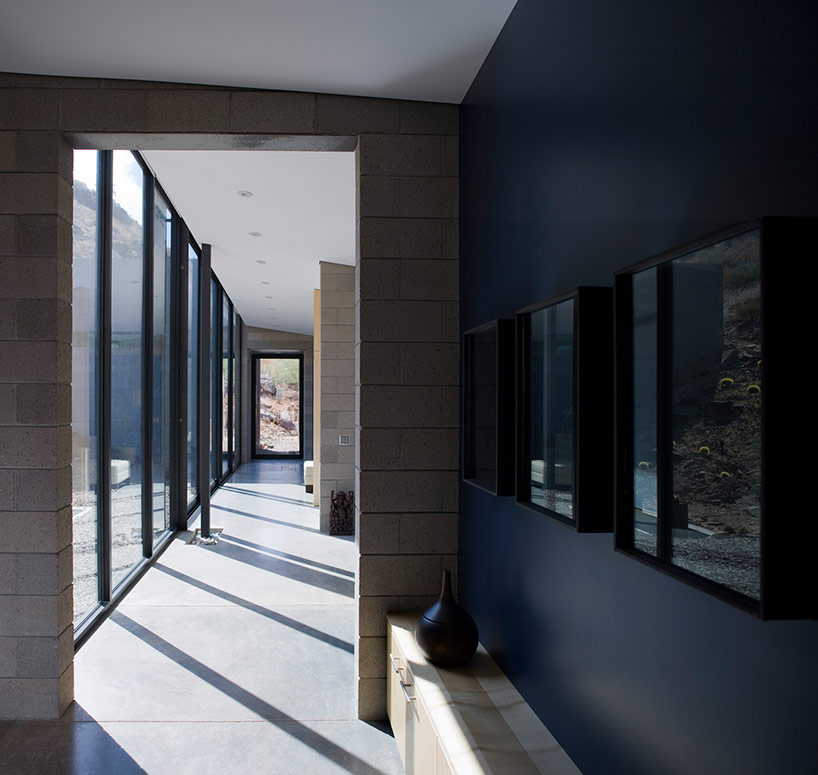 chen + suchart studio embed mummy mountain residence into a slope in arizona