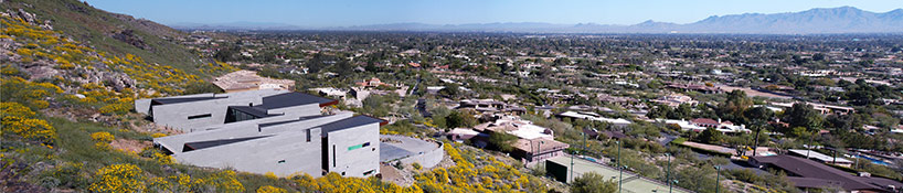 chen + suchart studio embed mummy mountain residence into a slope in arizona