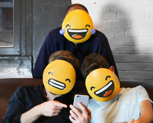 turn into your most-texted emoticon this halloween with new emoji face masks