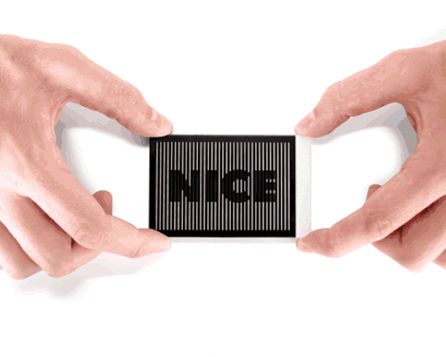 duncan shotton's business card case says 'nice to meet you' upon opening