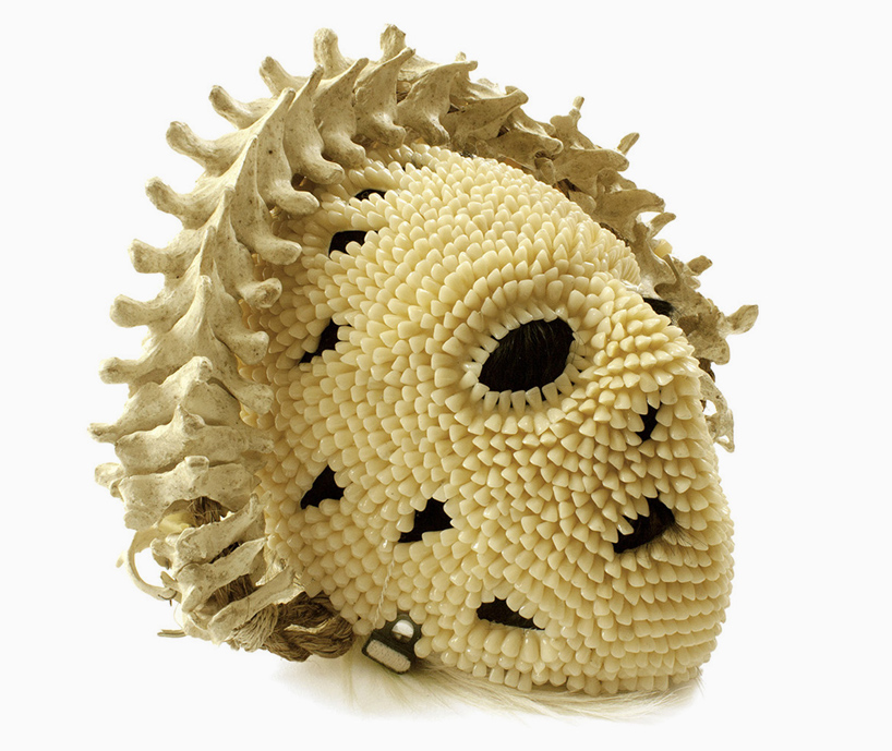 darwinian voodoo dons collection of ceremonial attire with thousands of teeth