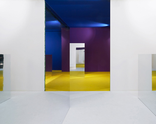 i29 installs colored volumes and mirrors that distort perception