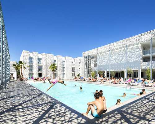 jacques ferrier architectures adds double façade to hotel in mediterranean coast