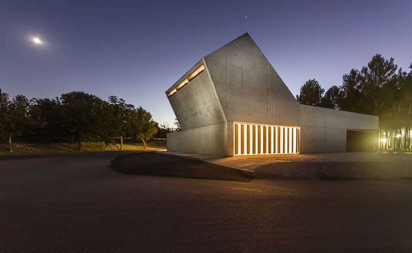 juan carlos salas' tanatorium filters sunlight through concrete chimney