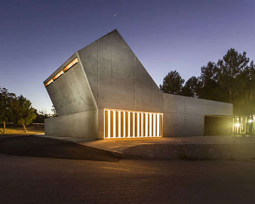 juan carlos salas' tanatorium filters sunlight through concrete chimney