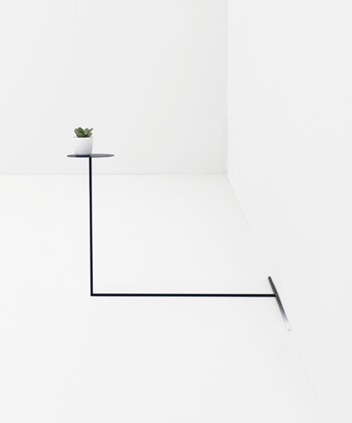 border table by nendo proposes new relationship between furniture + space