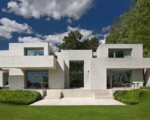 DS house by olivier dwek architectures subverts the rules of symmetry
