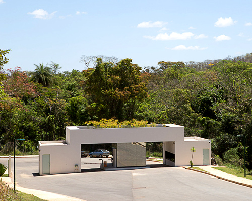 pedro barata adds greenery and a periscope to condo entrance pavilion in brazil