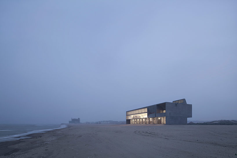 vector architects casts seashore library at water's edge, china