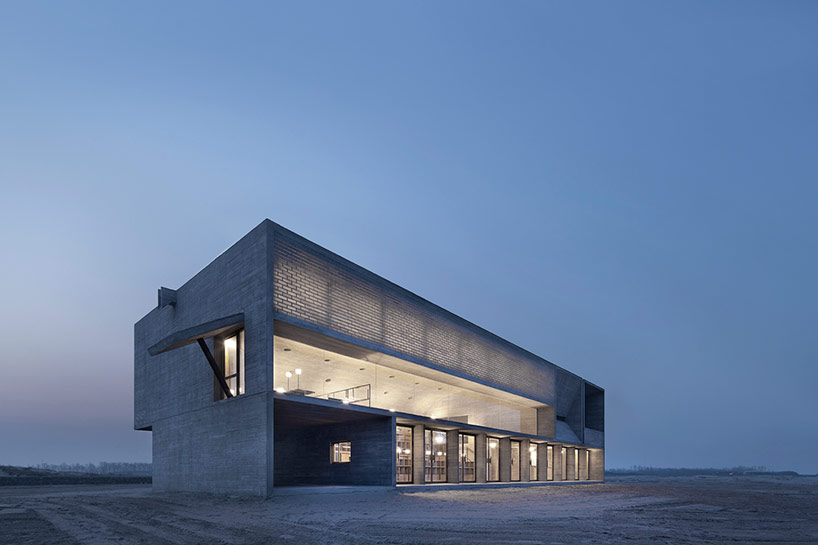 vector architects casts seashore library at water's edge, china