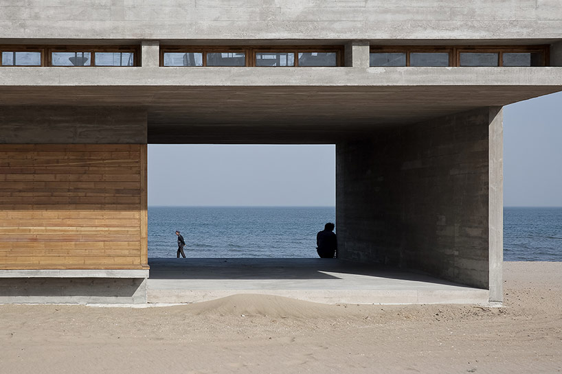 vector architects casts seashore library at water's edge, china