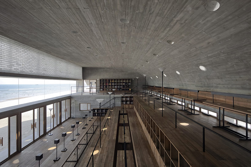 vector architects casts seashore library at water's edge, china