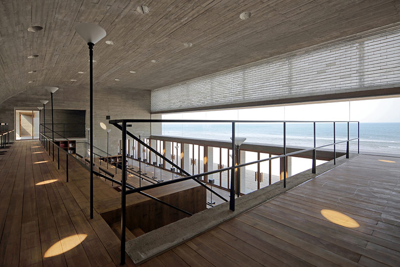 vector architects casts seashore library at water's edge, china
