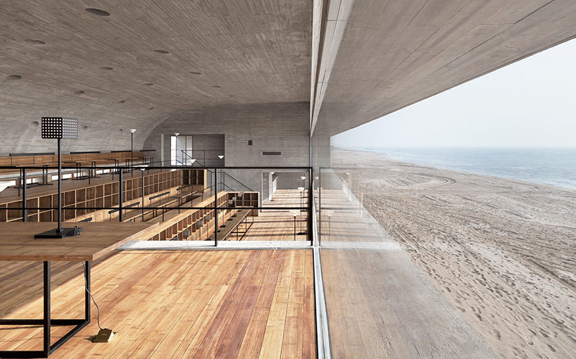 vector architects casts seashore library at water's edge, china