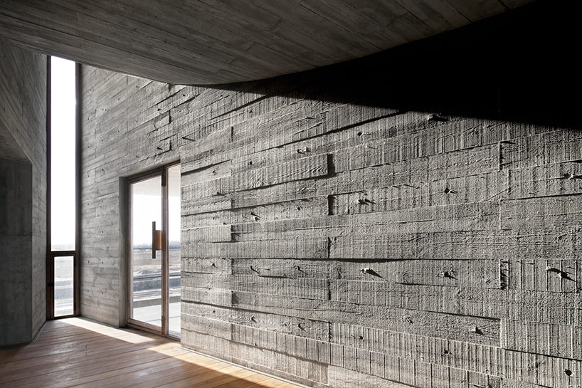 vector architects casts seashore library at water's edge, china