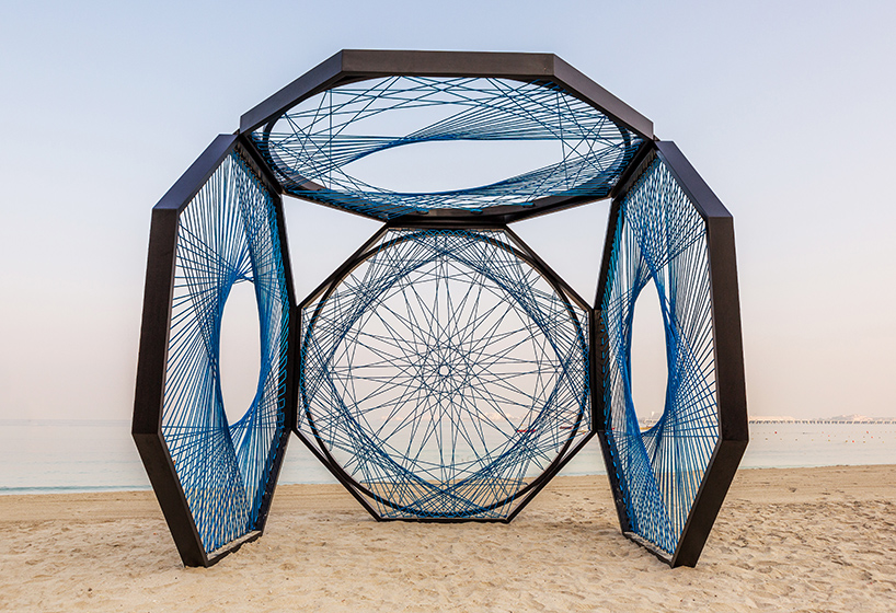 aljoud lootah weaves sculptural seaside installation using emirati fishing techniques