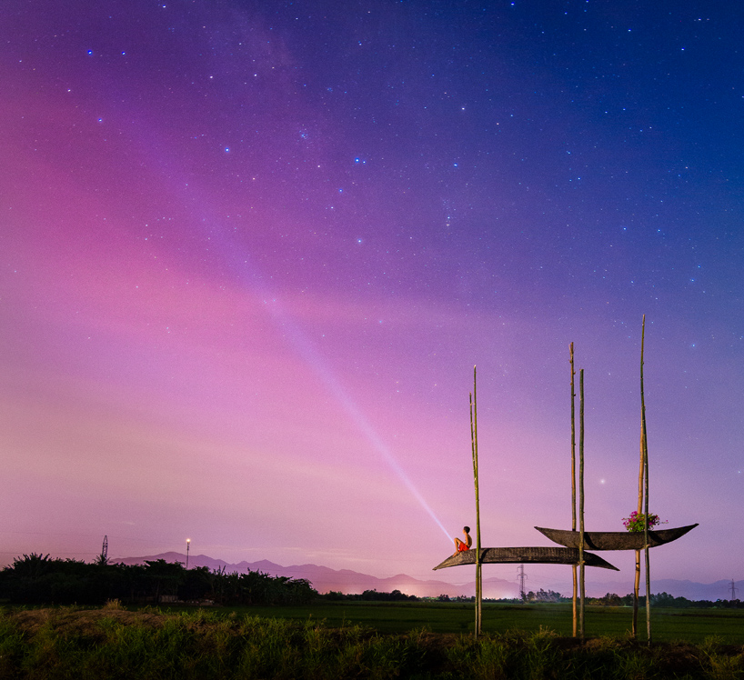 a21studio's boat and bamboo hut acts as shelter for vietnamese farmers
