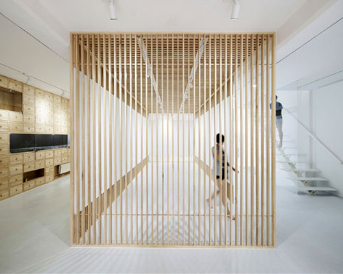 archstudio creates flexible art gallery space using folding screens in beijing