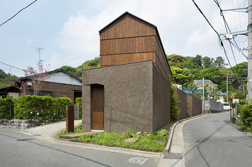 dgt creates house in oiso with timber volume on earthen foundation