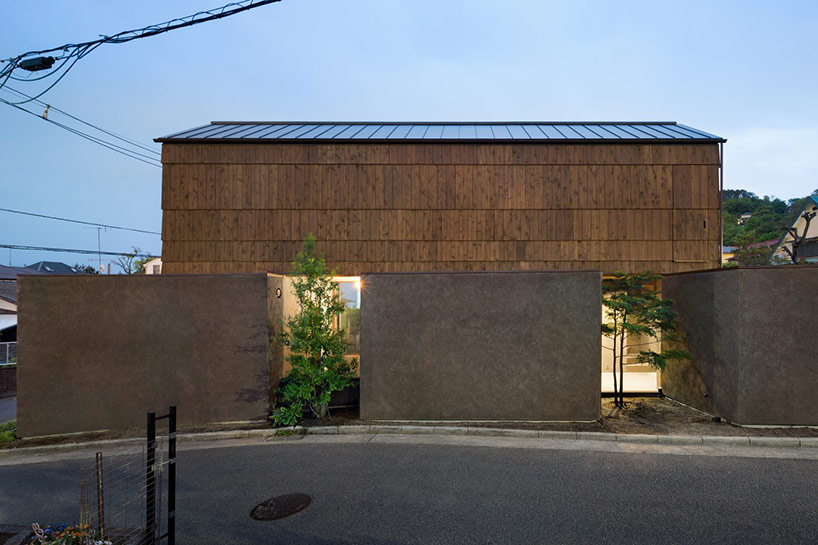 dgt creates house in oiso with timber volume on earthen foundation