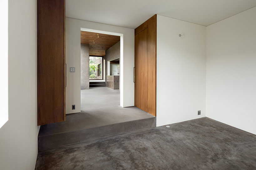 dgt creates house in oiso with timber volume on earthen foundation