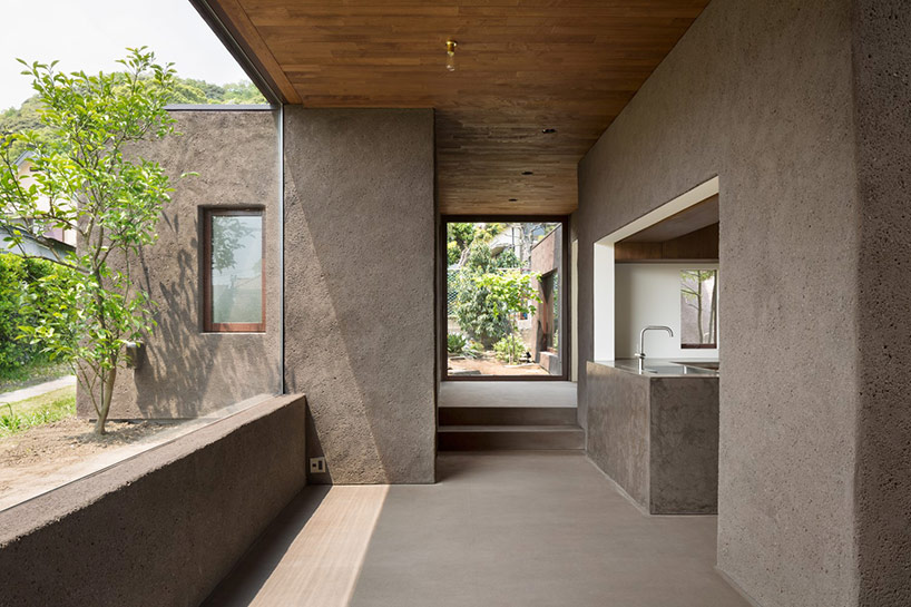 dgt creates house in oiso with timber volume on earthen foundation