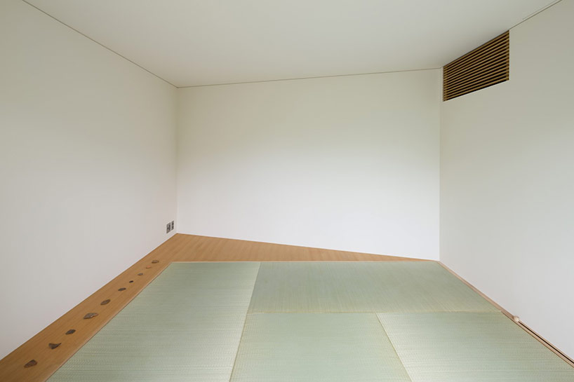 dgt creates house in oiso with timber volume on earthen foundation