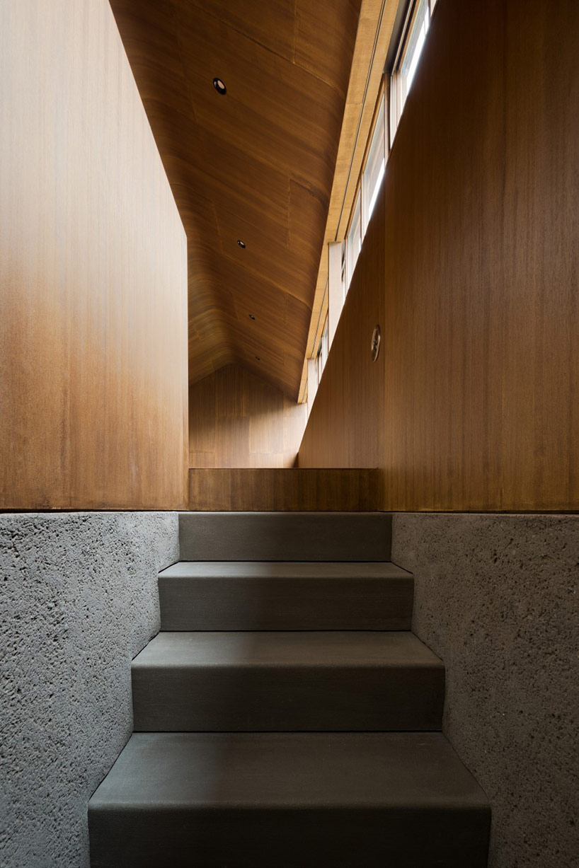 dgt creates house in oiso with timber volume on earthen foundation