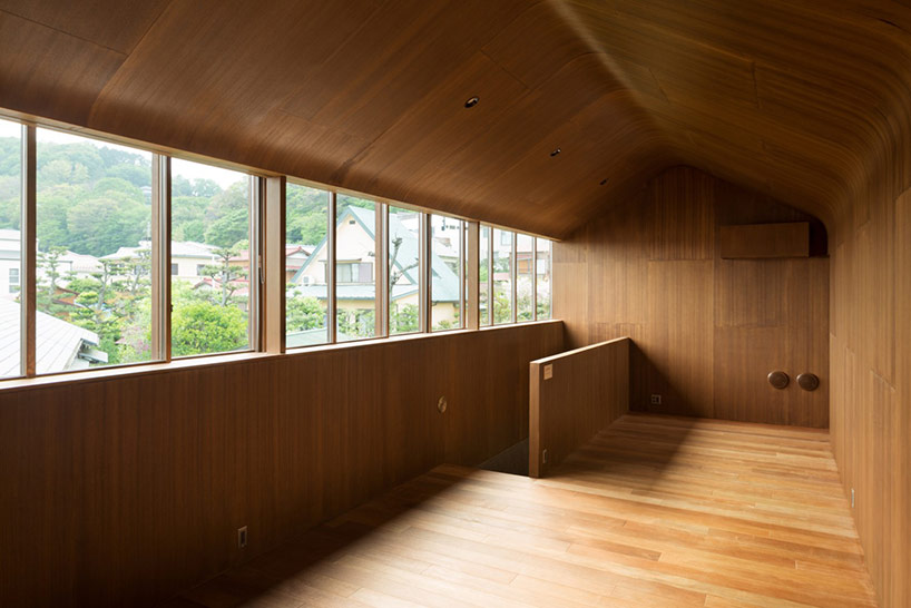 dgt creates house in oiso with timber volume on earthen foundation