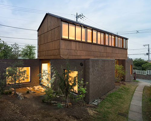 dgt creates house in oiso with timber volume on earthen foundation