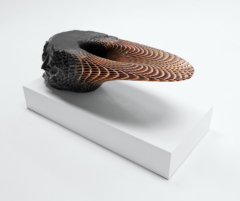 janne kyttanen sculpts 'metsidian' metamorphosing metal furniture