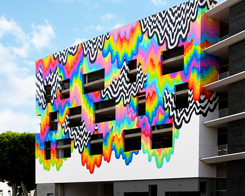 jen stark oozes drippy, technicolor mural across california building façade
