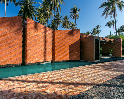 NPDA studio constructs a red brick retirement home in thailand