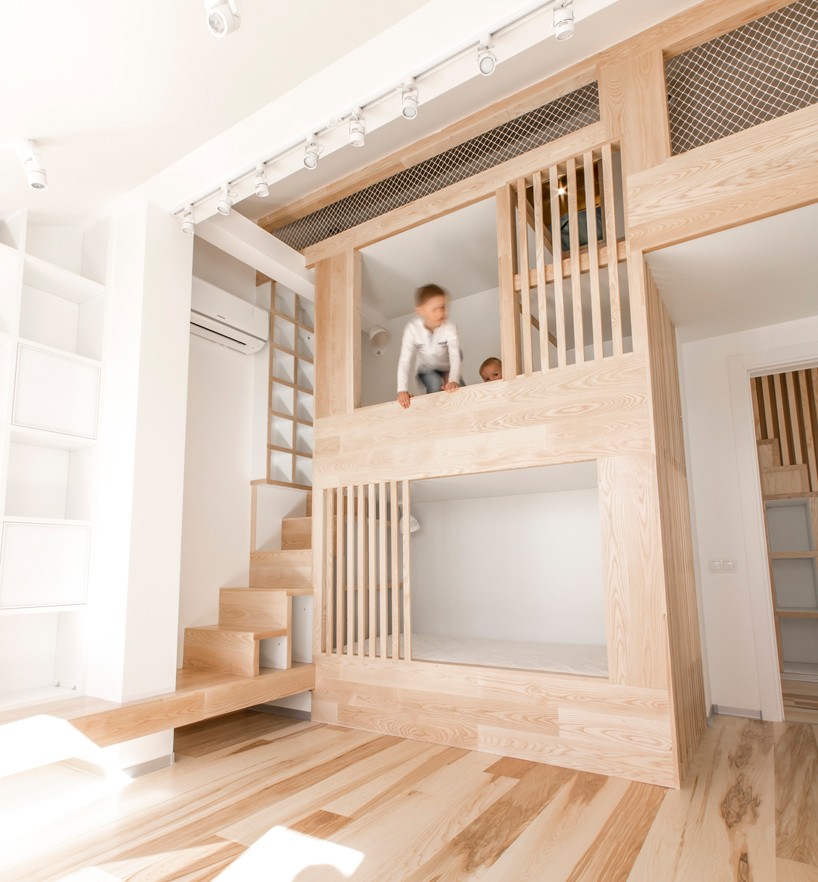 ruetemple installs two-level play frame into moscow apartment attic