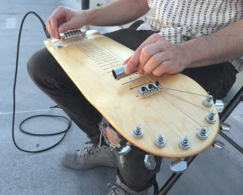 stereotank transforms a blank skate deck into lap steel guitar