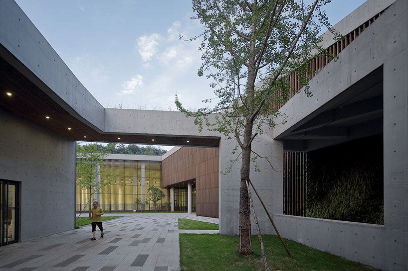 vector architects completes green-covered chongqing taoyuanju community center