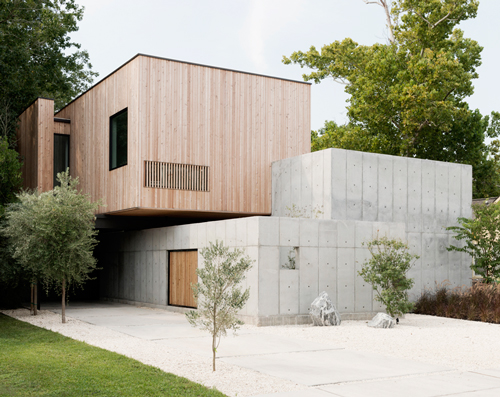 christopher robertson overlaps concrete + timber volumes in refined texas home