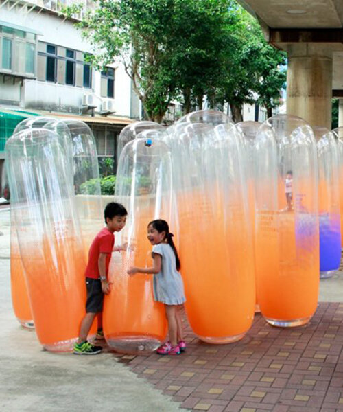 city yeast creates anemone-like scene with 1000 cylinder balloons in taipei