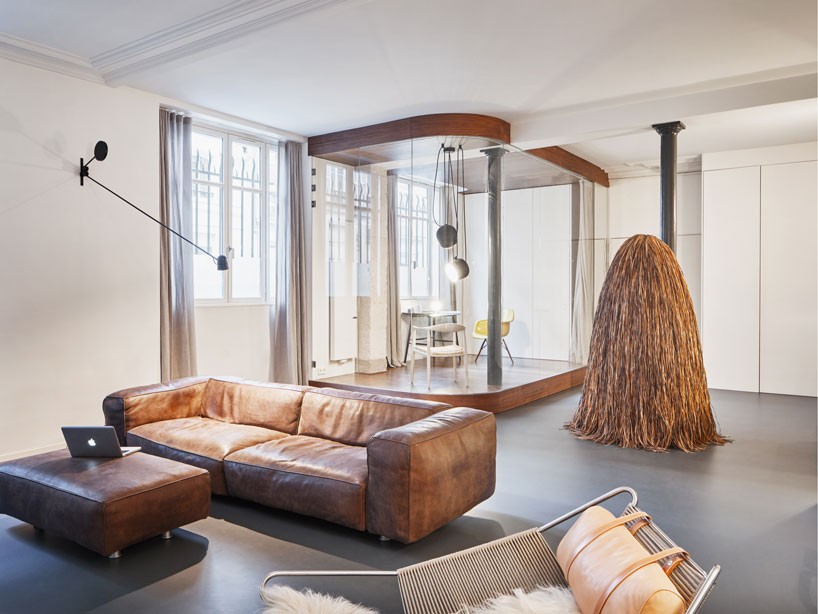 cut architectures inserts transparent volume within spacious parisian loft