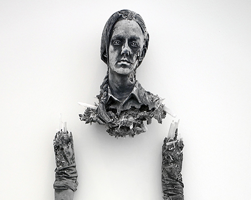 daniel arsham forms broken figure from crystal and volcanic ash
